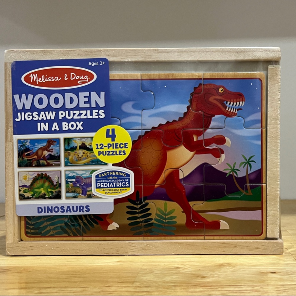 Melissa & Doug Wooden Dinosaur Puzzles 4 in one box. New, shrink wrap still on!